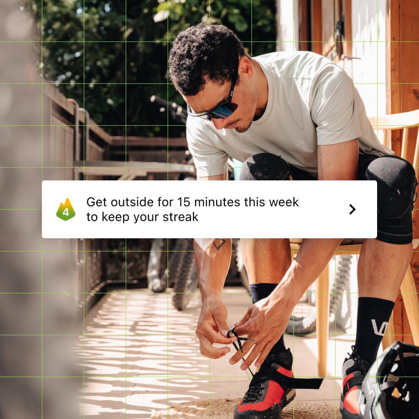 Adventure Streaks nudge over a cyclist lacing shoes